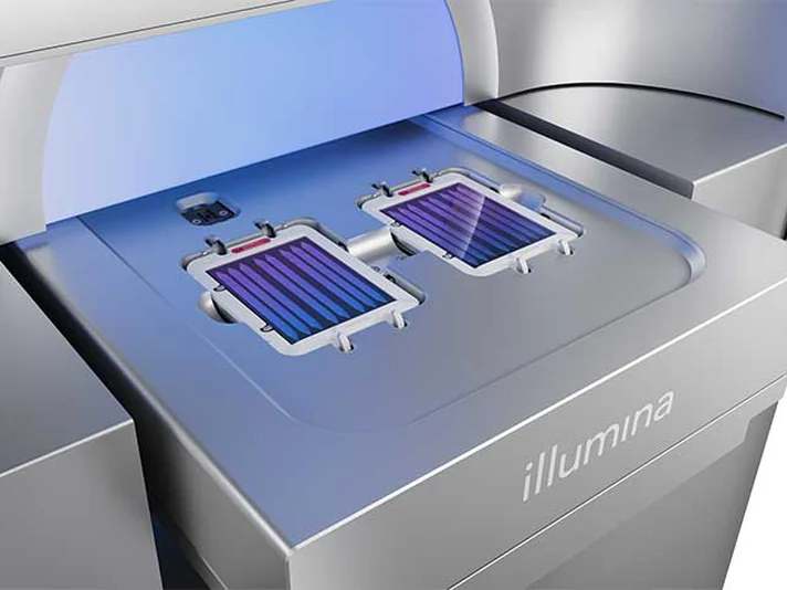 Two flow cells loaded on the stage of an Illumina sequencer